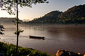 Luang Prabang, Laos - Sunset along the Mekong riverfront.  